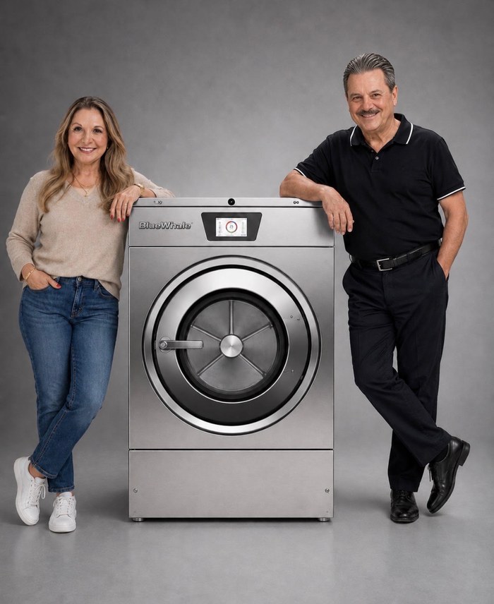 Larry and Marilyn Larsen with a Blue Whale washer-extractor